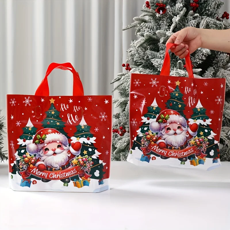 Feiertags-Weihnachtsmann-Weihnachtsbaum-Geschenktüte, rote Tragetasche aus Kunststoff „Frohe Weihnachten“, perfekte festliche Partydekorationen und Geschenke Image