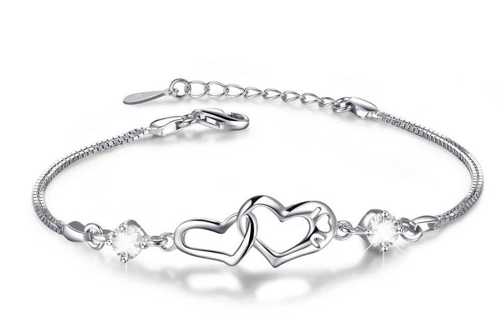White Gold Plated Crystal Heart Tennis Bracelet Plated Brass, Interlock Design White Gold Plated Crystal Heart Tennis Bracelet Plated Brass, Interlock Design