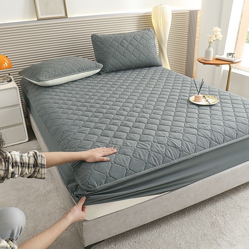 wasserdichter Matratzenschoner mit Urinschutz, gesteppter, rutschfester Vollbezug für Matratzen und Lattenroste Image
