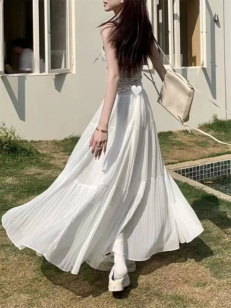 2025 Primavera ed estate Nuova gonna a trapezio a pieghe nella gonna lunga in garza sottile a vita alta Gonna da donna Gonna lunga elegante ed elegante