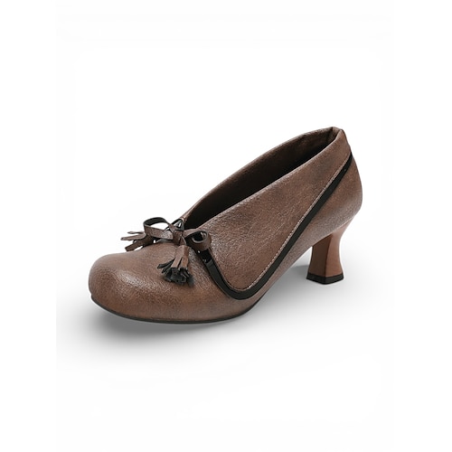 Weiße Vintage-Pumps aus Leder im Stil der 1950er-Jahre – Retro-Mod-Pumps mit zweifarbigem Blockabsatz und Schleifenverzierung, elegante Schuhe mit niedrigem Absatz. Image
