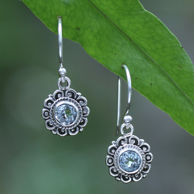 'Floral-Inspired Silver Dangle Earrings with Blue Topaz Gems'