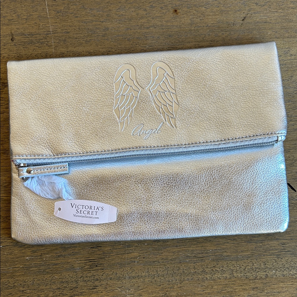 Victoria's Secret Bags | Victoria's Secret Metallic Silver Foldover Clutch W/ An Embossed Angel Wing Logo | Color: Silver/Tan | Size: Os