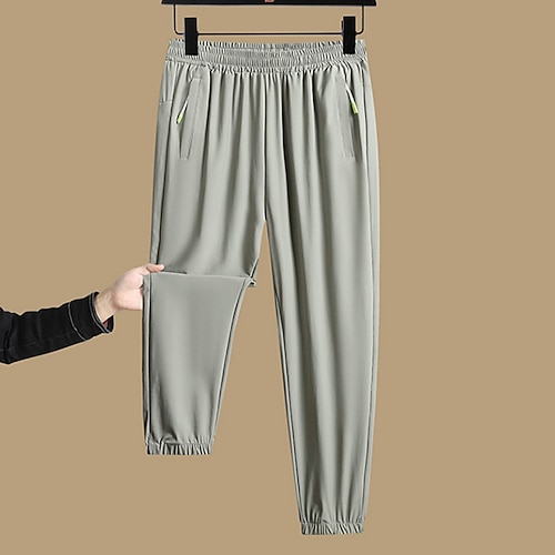 Herren Jogginghose Jogger Hose Freizeithose Sommerhose Schnelltrocknende Hose Kordelzug Elastischer Bund Einfach Komfort Schnelltrocknend Täglich Outdoor Ferien Mode Klassicher Stil Blau Schwarz Image