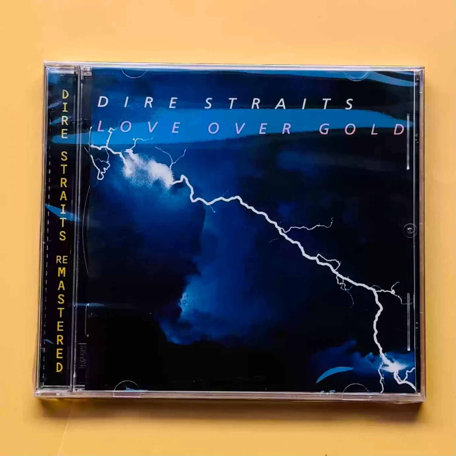 Dire Straits "Love Over Gold" Remastered Rock-CD Zeitlose Gitarrengetriebene Klassische Rock-Klassiker Ikonische 80er-Jahre-Rockaufnahmen Image