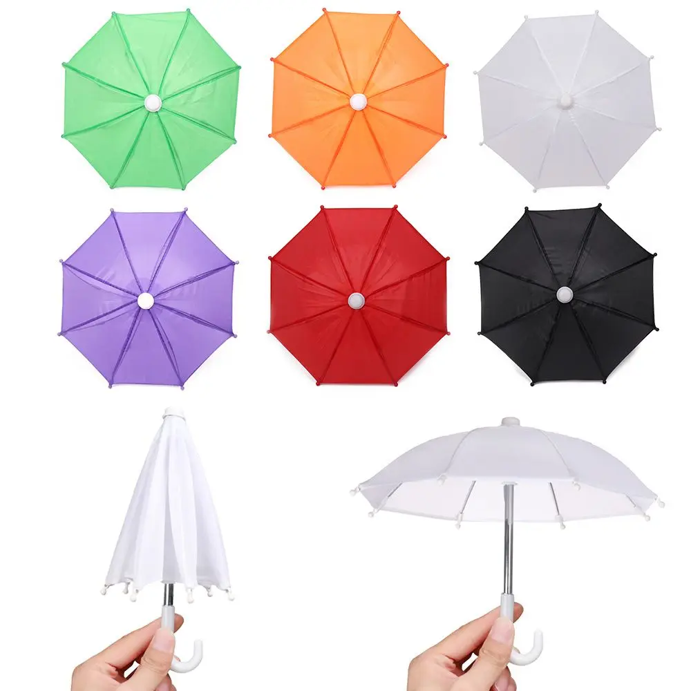 Neue Art bunte Kunststoff Mini Regenschirm Regen bekleidung Spielzeug Regenschirm Baby Spielzeug Mädchen Geschenk Puppe Verzierung Puppe Kleidung Dekoration