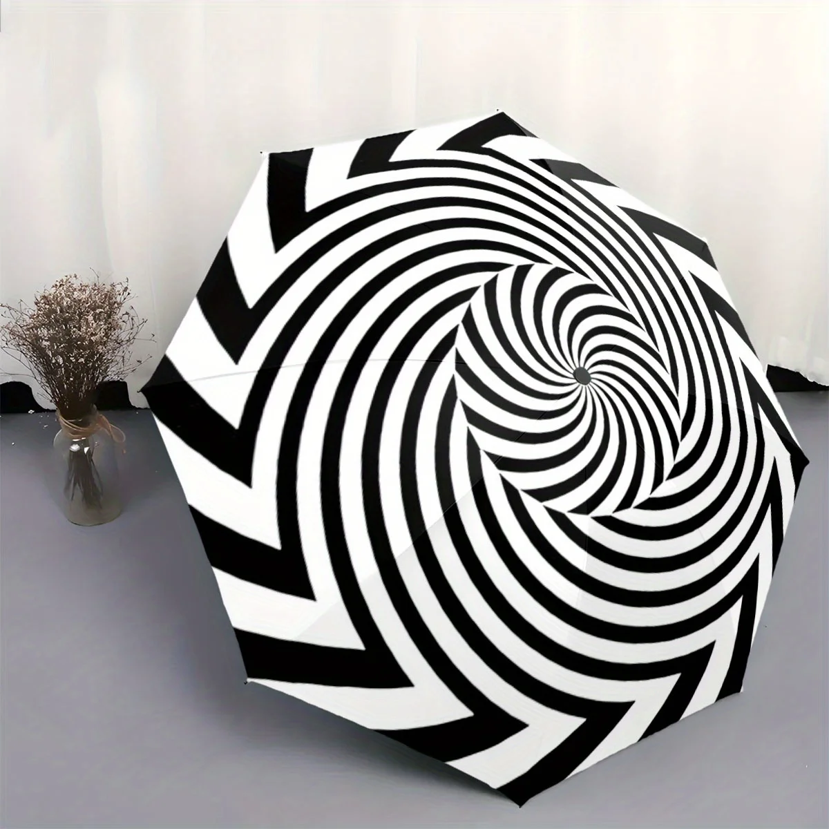 Automatisch faltbarer Regenschirm mit spiralförmigem schwarz-weißem optischem Illusionsdesign – tragbarer, zusammenklappbarer, leichter und langlebiger Rahmen Image