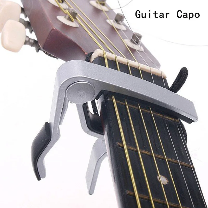 Hochwertiger Aluminium-Legierung Silberner Schnellwechsel-Klemmschlüssel Akustik- und Klassikgitarren-Capo zur Tonanpassung Image