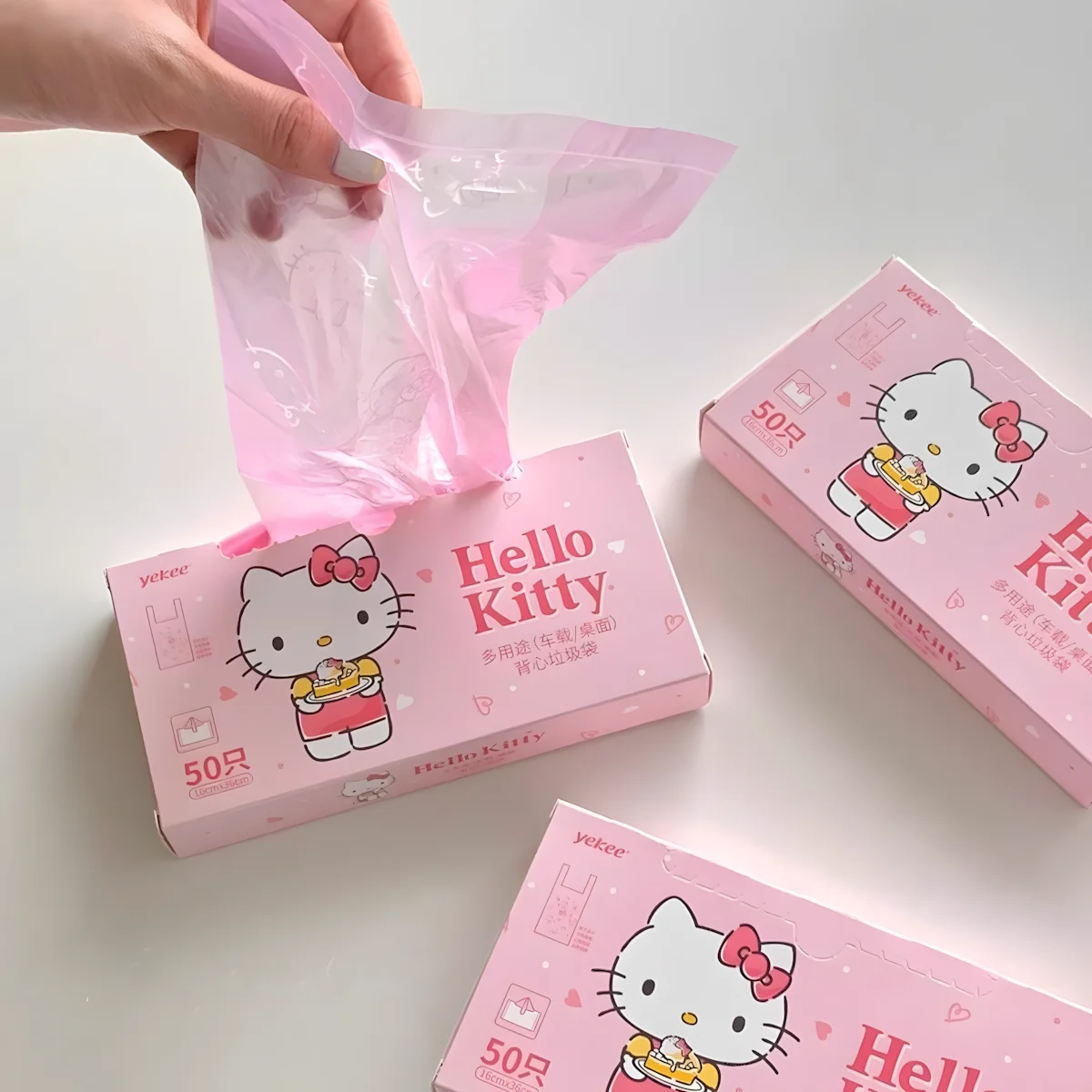 Vielseitig Einsetzbare 50 Stück Hello Kitty Sanrio Rosa Einfache Müllbeutel Einweg-Küchenplastiktüten Tragbare Schreibtisch- und Auto-Müllaufbewahrungsbeutel