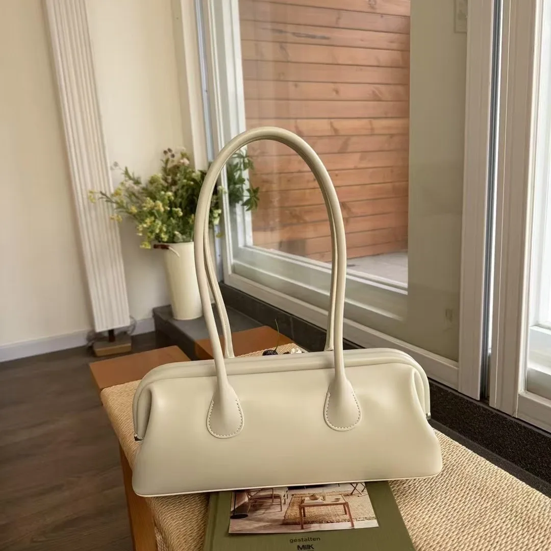 FIRMRANCH mode à la mode couleur unie en cuir de vachette pince ouverture conception femmes simple épaule sous les bras sac Premium bâton sac
