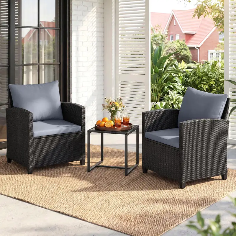 Rattan-Gartenmöbel-Set mit 2 Stühlen mit Kissen und Glastisch, Sitzgruppe für den Außenbereich, schwarz und grau.