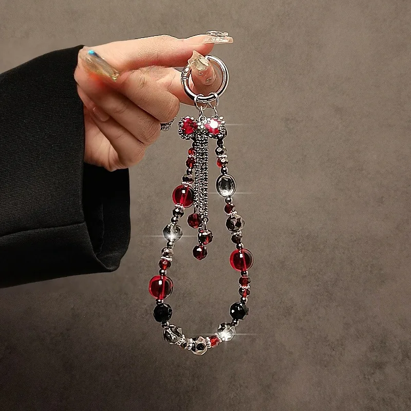 Hochwertige Kurze Handykette mit Schleifenquaste - Elegantes Accessoire für Smartphones Image