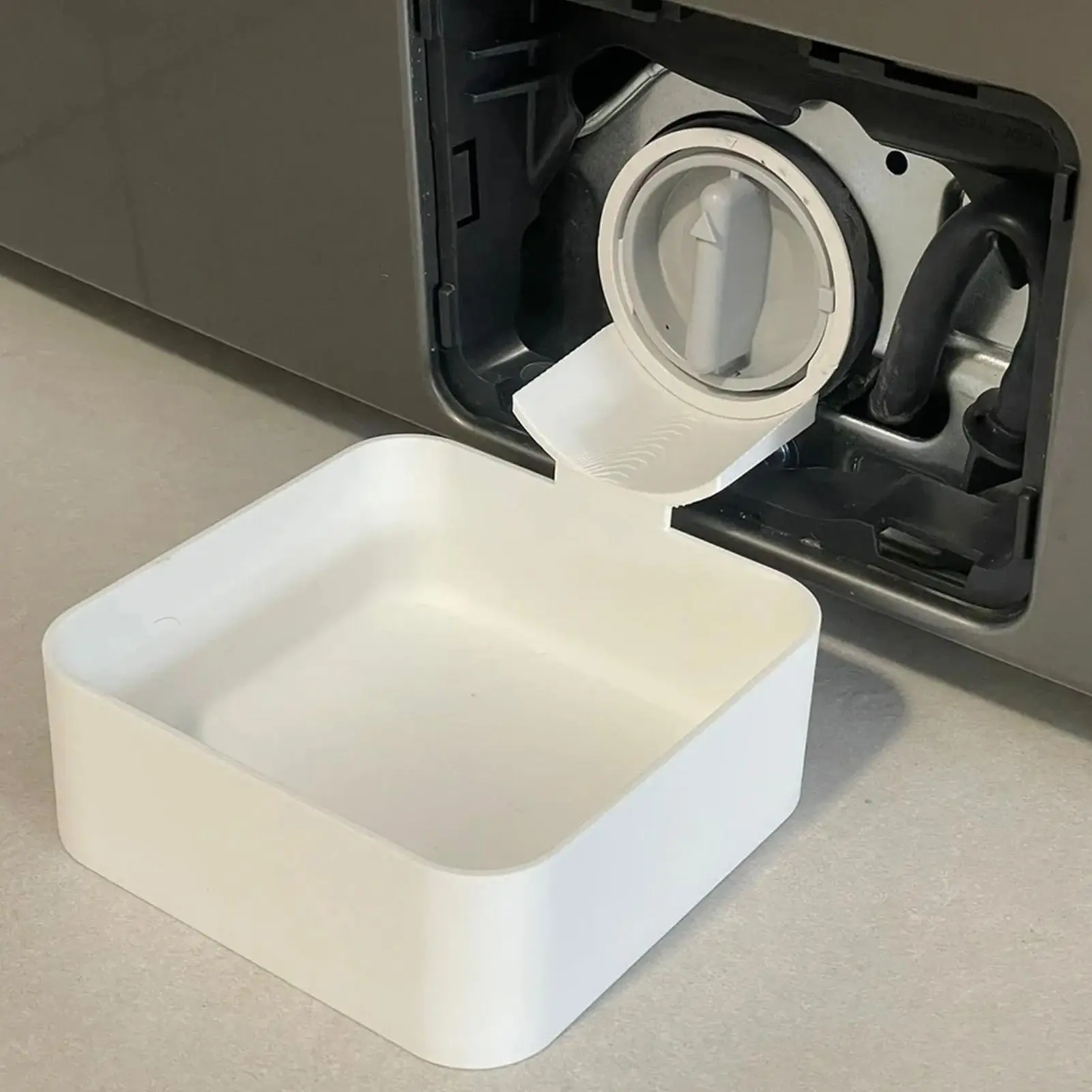 The Drip Tray At The Washing Machine Drain Can Collect Residual Water and Lint Stains The Floor Clean Washing Machine Tray