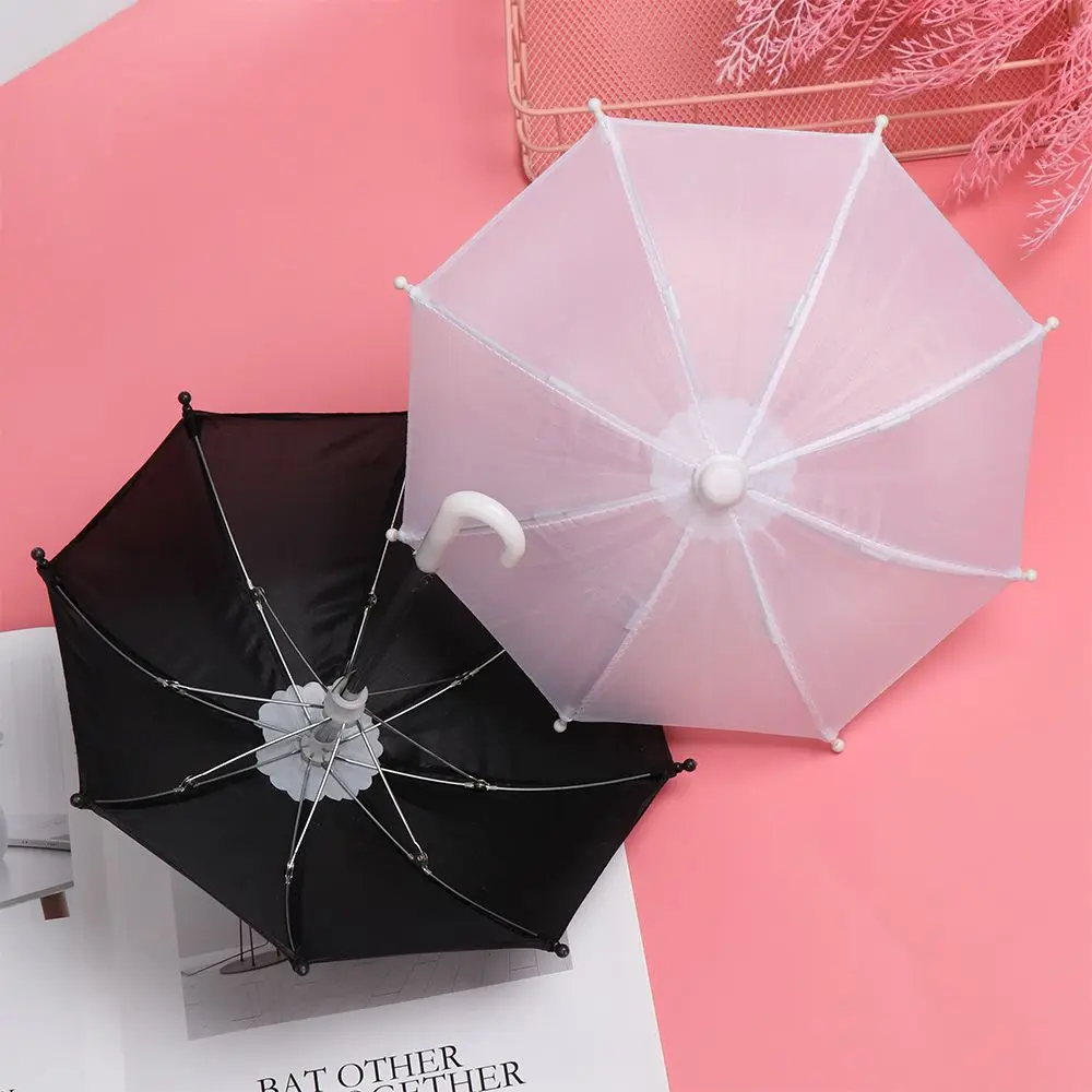 Bunter Kunststoff Mini Regenschirm Regenausrüstung Spielzeug Regenschirm Baby Spielzeug Mädchen Geschenk Puppe Verzierung Puppenkleidung Puppenverzierung