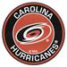 FANMATS NHL Carolina Hurricanes Roundel 27 in. x 27 in. Non-Slip Indoor Only Mat Synthetics in Brown/Pink/Red | Wayfair 18866