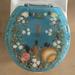 Daniels Bath Sea Treasure Decorative Round Toilet Seat Polyresin Toilet Seats | 2 H x 17 W x 14 D in | Wayfair SEA TREASURE BLUE