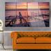 Design Art 'Fishing Pier in Sea at Sunset' 4 Piece Photographic Print on Metal Set Metal in Indigo | 28 H x 48 W x 1 D in | Wayfair MT14741-271