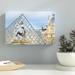 Winston Porter 'King Louis XIV in Front of the Glass Pyramid' by Cora Niele - Wrapped Canvas Print Metal | 32 H x 48 W x 2 D in | Wayfair