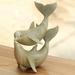 Dovecove Oneill Hand Carved Dolphin Wood Figurine Wood in Brown/Gray/Green | 7.5 H x 6.3 W x 3.1 D in | Wayfair B60E196FC1D54AA9A2F312E962BF42B1