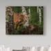 Trademark Fine Art 'Inquisitive Mountain Lion' Photographic Print on Wrapped Canvas in Brown/Green | 18 H x 24 W x 2 D in | Wayfair
