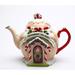 The Holiday Aisle® Santa's Village Ceramic Teapot Porcelain China/Ceramic in Brown/Green/Red | 7.25 H x 5.625 W x 8.875 D in | Wayfair
