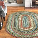 Green 96 x 0.5 in Area Rug - Andover Mills™ Orval Geometric Handmade Braided Area Rug Polypropylene | 96 W x 0.5 D in | Wayfair