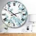 East Urban Home Teal Cherry Blossoms II - Traditional wall clock Metal in Blue/White | 23 H x 23 W x 1 D in | Wayfair