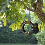 Loon Peak® Shoup Bear Swinging on Tire Decorative Bird Feeder Stone, Glass in Black/Gray | 8 H x 9 W x 4 D in | Wayfair